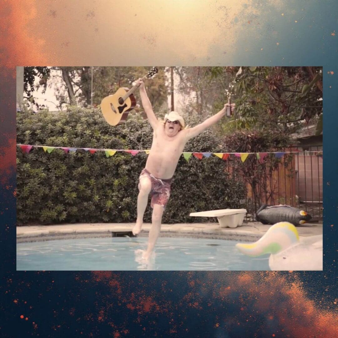 A boy excitedly jumps into a swimming pool on a sunny day.